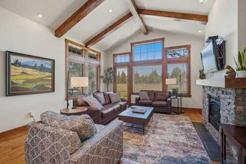 Sink into the leather sofas and let the soaring wood beams and mountain views wrap around you—your perfect spot to relax by the fire after exploring.