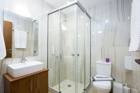 Apartment, 1 Bedroom | Bathroom | Shower, free toiletries, hair dryer, towels