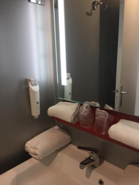 Shower, eco-friendly toiletries, hair dryer, towels