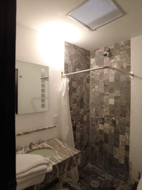 Double Room, 2 Double Beds | Bathroom | Shower, towels, soap, shampoo