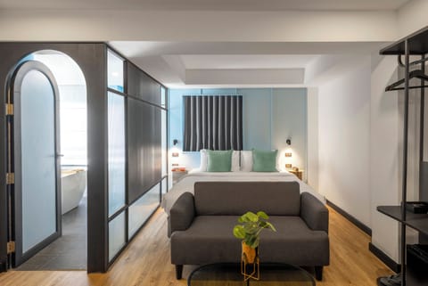 Suite, 1 Double Bed | Minibar, in-room safe, blackout drapes, free WiFi