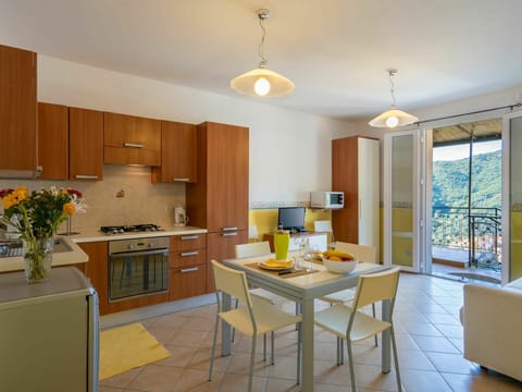 Room, Countertop, Furniture, Property, Kitchen, Cabinetry, Interior Design, Yellow, Building, Floor