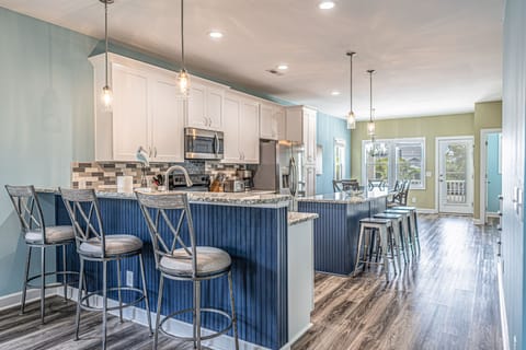 Well-stocked kitchen that seats 12+. 