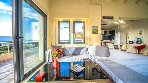 Large balcony doors in the living room offer incredible views!