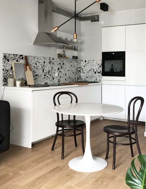 Kitchenette with dining table.