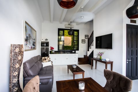 Exclusive Villa, 1 Bedroom | Living area | 40-inch LCD TV with cable channels, TV