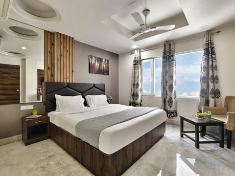 Executive Quadruple Room, 2 Double Beds | Desk, laptop workspace, soundproofing, iron/ironing board