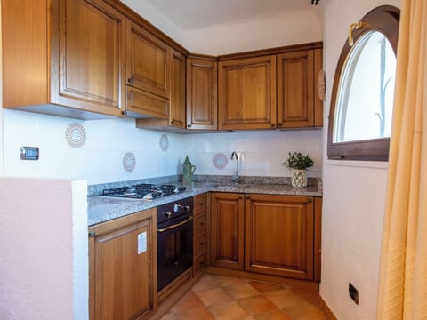 Kitchen, Countertop, Kitchen Appliance, Major Appliance, Wood, Cabinetry, Flooring, Interior Design, Floor, Home Appliance