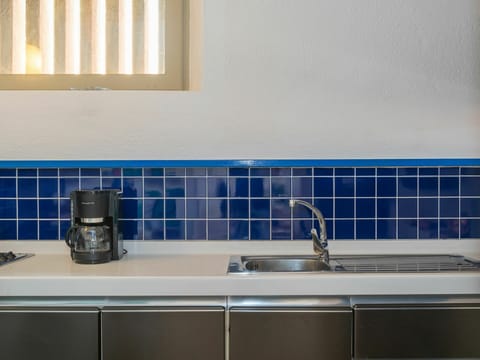 Tap, Kitchen Sink, Sink, Plumbing Fixture, Countertop, Cabinetry, Purple, Kitchen, Interior Design, Flooring