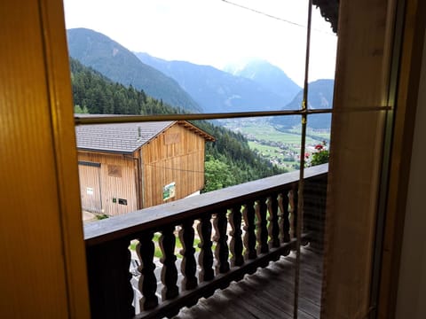 Sky, Property, Building, Mountain, Wood, Tree, Architecture, Fence, Plant