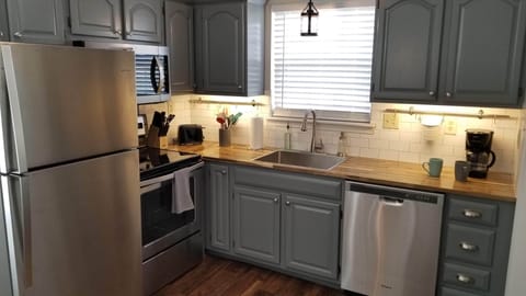 Fully stocked kitchen with coffee maker, toaster