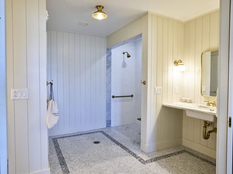 Rainfall showerhead, designer toiletries, hair dryer, bathrobes