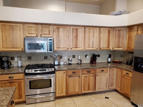 Kitchen has plenty of room and EVERYTHING you need. We like cooking and baking.