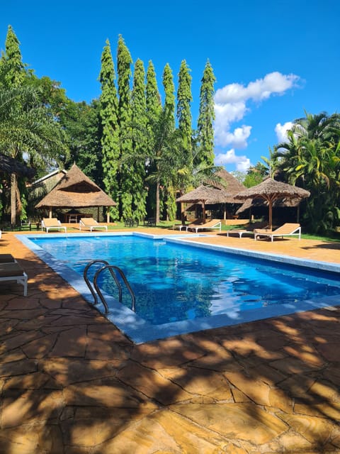 Outdoor pool, free cabanas, pool umbrellas