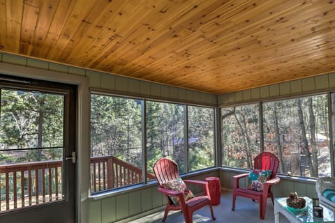 The screen porch is comfortable and quiet except for the sound of the river.