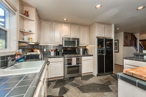 Kitchen with Island and High End Appliances Plus USB Outlets