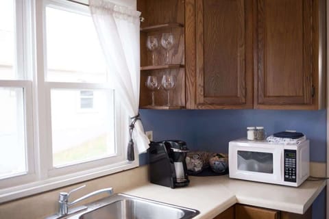 Morning-ready with coffee maker, microwave, toaster, and everything you need.