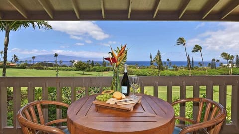 Enjoy alfresco dining with breathtaking ocean views and lush greenery right from your private lanai
