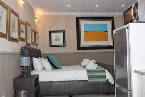 Comfort Studio Suite | Premium bedding, Select Comfort beds, in-room safe, laptop workspace