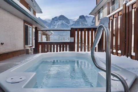The deck`s hot tub offers incredible mountain views.