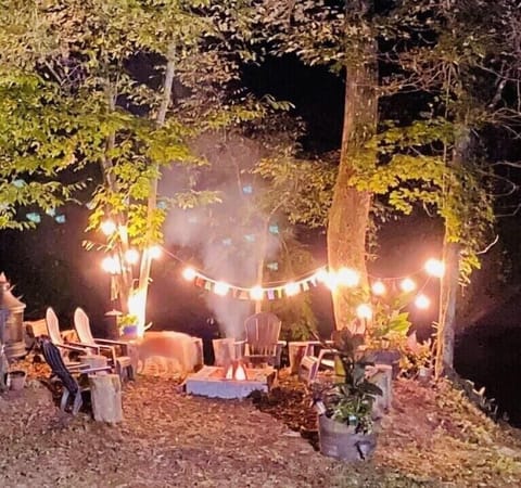 Fire pit area with string lights
