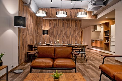 Apartment, 3 Bedrooms | Living area | 65-inch flat-screen TV with digital channels, TV