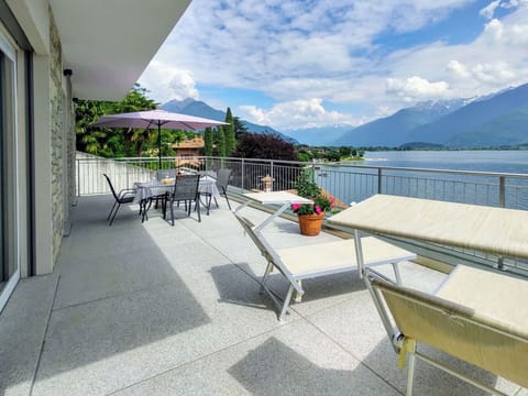 Sky, Cloud, Water, Property, Plant, Building, Flowerpot, Shade, Table, Outdoor Furniture