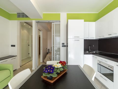 Cabinetry, Property, Furniture, Countertop, Building, Lighting, Architecture, Interior Design, Kitchen Appliance, Gas Stove