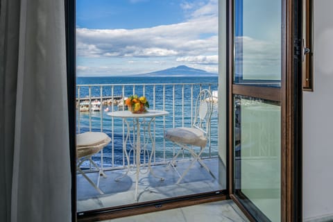 Apartment, 1 Bedroom, Sea View | 1 bedroom, bed sheets