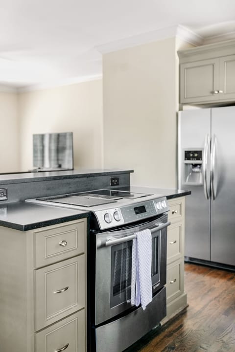My kitchen has a Jennaire range, full size fridge with ice maker, & dishwasher.