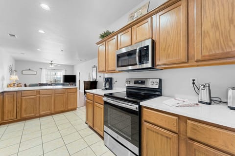 Kitchen equipped with full size Appliances.