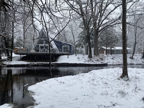 Looking at cabin from across the river