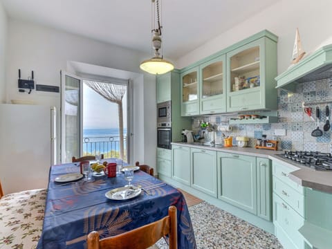 Cabinetry, Table, Furniture, Countertop, Chair, Interior Design, Architecture, Kitchen, Wood, Drawer