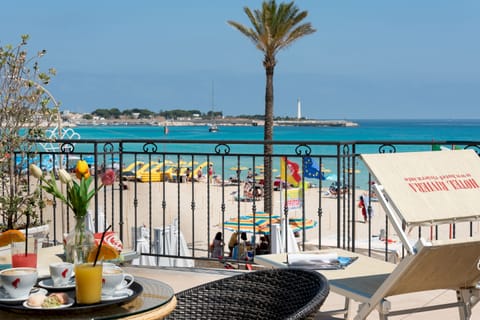 Family Room, Sea View, Beachfront | Premium bedding, down comforters, minibar, in-room safe