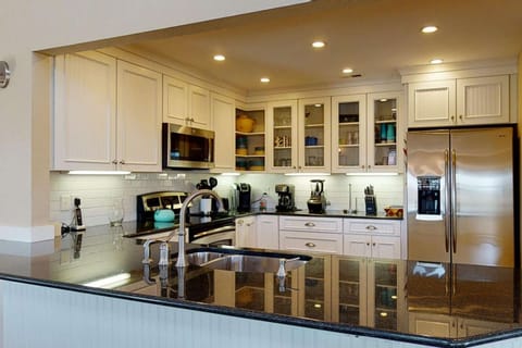 There is a nicely updated large granite counter in the kitchen so you can make that great meal for the entire crew