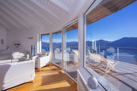 Honeymoon Apartment, 2 Bedrooms, Fireplace, Mountainside (The Perfect View in a Premeno) | Living area | 22-inch flat-screen TV with digital channels, TV, fireplace