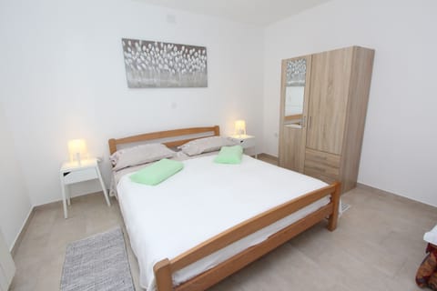 Apartment, 1 Bedroom | 1 bedroom, iron/ironing board, free cribs/infant beds, free WiFi