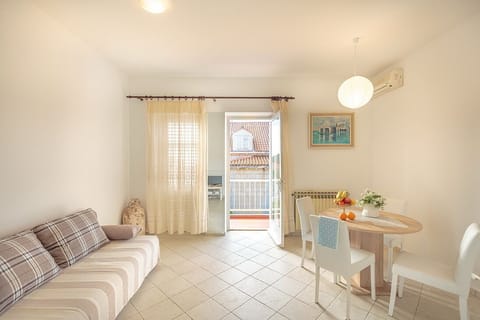 Standard Apartment, 2 Bedrooms, Balcony | Living room | TV