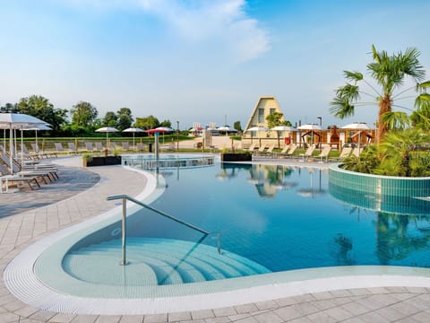Sky, Water, Cloud, Building, Property, Swimming Pool, Azure, Tree, Seaside Resort, Leisure