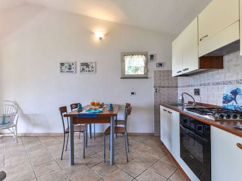 Oven, highchair, freezer, dining tables