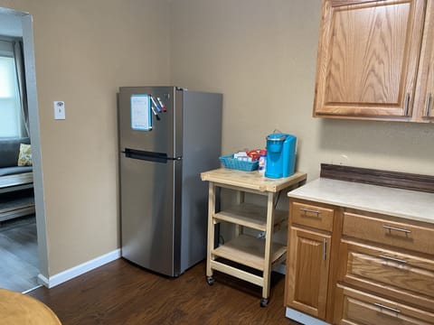 Keurig, pods, creamers, sugar, tea, hot chocolate, snacks h2o bottles in fridge 