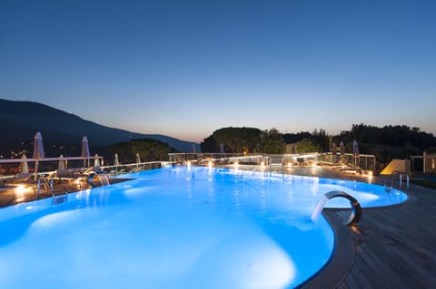 Outdoor pool, open 9:00 AM to 7:00 PM, pool umbrellas, sun loungers