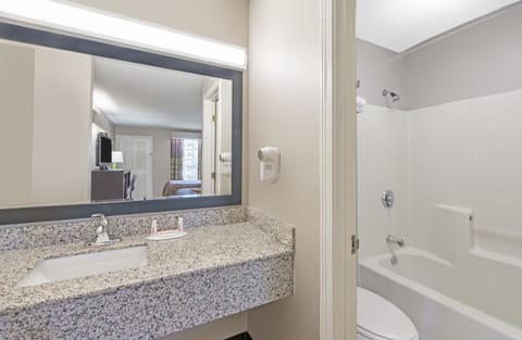 Room, 2 Double Beds, Non Smoking | Bathroom | Combined shower/tub, deep soaking tub, free toiletries, hair dryer