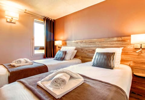 Premium bedding, memory foam beds, desk, laptop workspace