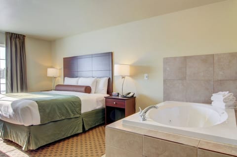 Suite, 1 King Bed, Non Smoking | In-room safe, individually decorated, individually furnished, desk