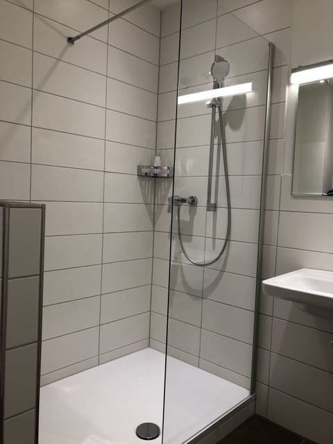 Shower, free toiletries, hair dryer, towels