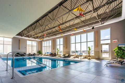 Indoor pool, open 8:00 AM to 10:00 PM, pool umbrellas, sun loungers