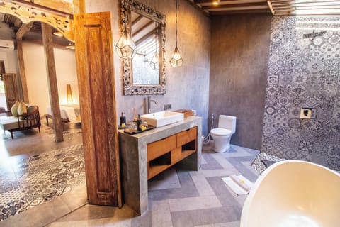 Two Bedroom Suite, Garden View | Bathroom | Separate tub and shower, towels