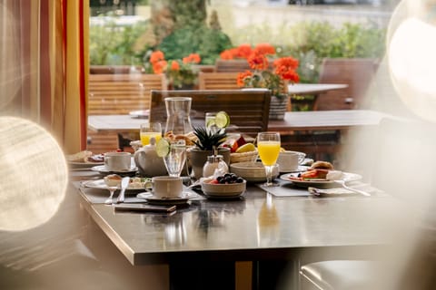 Daily buffet breakfast (EUR 15.9 per person)