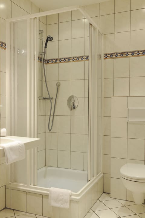 Shower, free toiletries, bathrobes